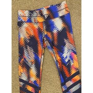 Athleta‎ Lava Sonar Capri Cropped Leggings Size S Zip Pocket Blue Colorful Logo